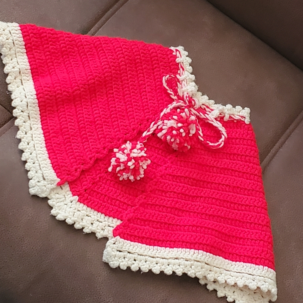 Vintage hand crocheted girl's poncho with pom poms red and cream